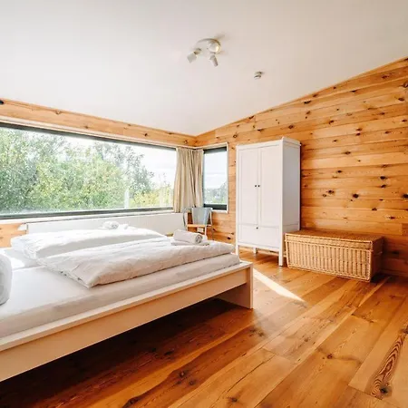 Дом отдыха Ferienhaus-haus-uebersee Schwarz (Mecklenburgische Seenplatte)